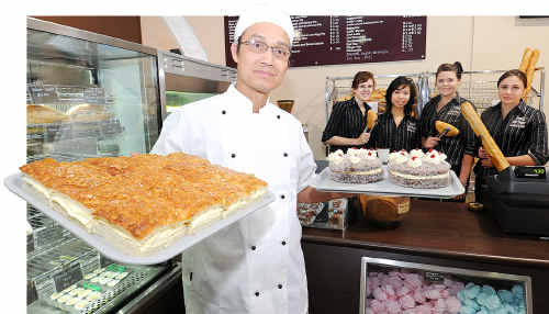 Van Pham Phuong with Hannah, Teresa, Candice and Lauren at the Maryborough French Hot Bread bakery and cafe. Van Pham Phuong with Hannah, Teresa, Candice and Lauren at the Maryborough French Hot Bread bakery and cafe.